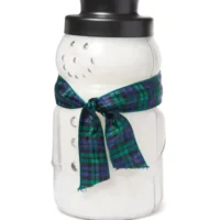 Snowman jar candle with plaid ribbon.