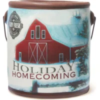 Holiday homecoming barn scene candle.