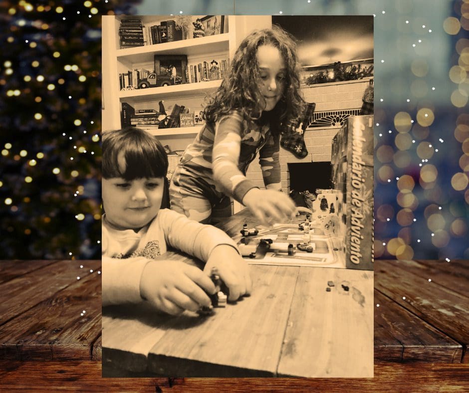 Two little boys playing with small Lego builds from and Advent Calendar