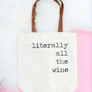 Canvas Tote bag with faux leather handles with typewriter font that reads "Literally all the wine"