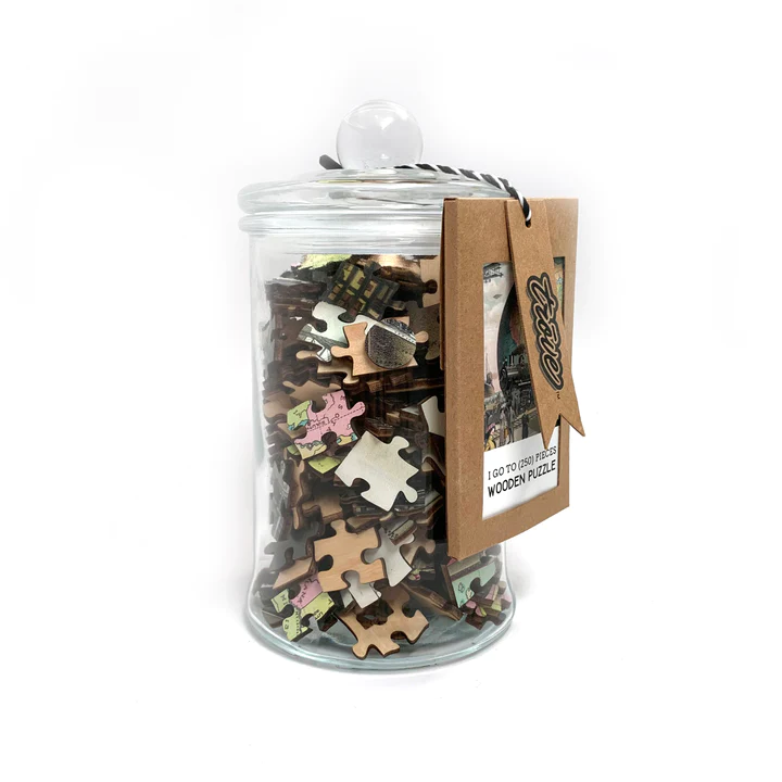 I Go to Pieces Wooden Puzzle: 20th Century Transportation in Apothecary Jar - Image 2